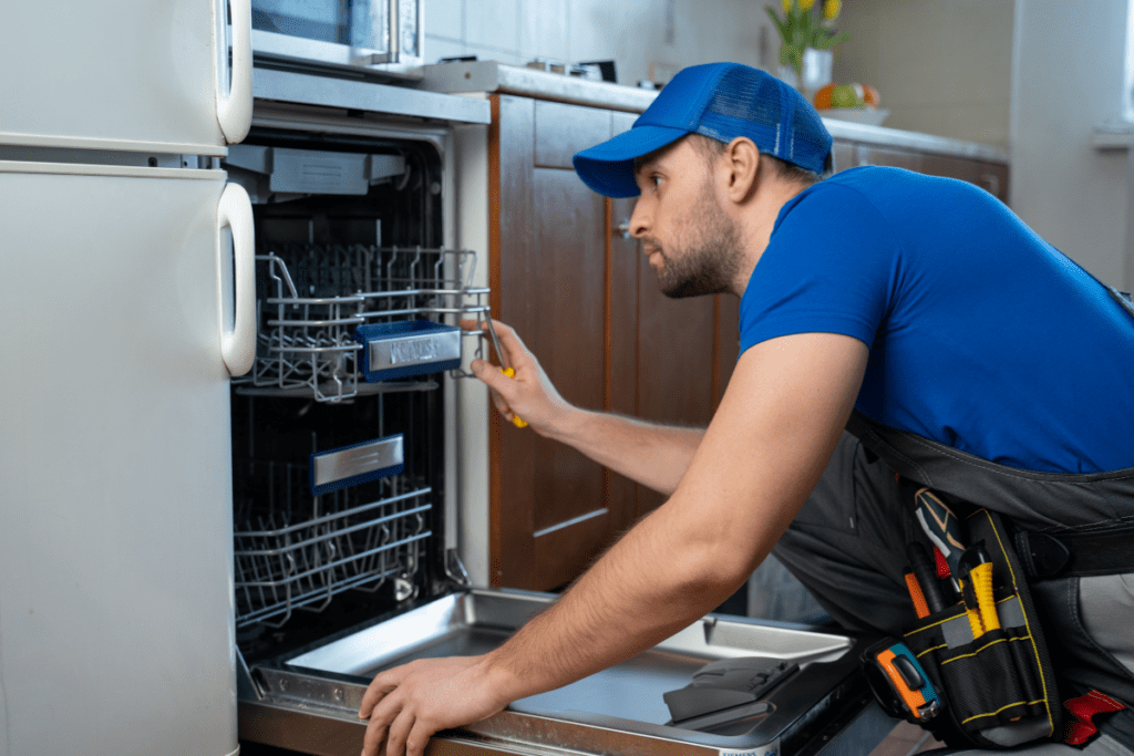 Appliance Repair Professional Fixing Dishwasher