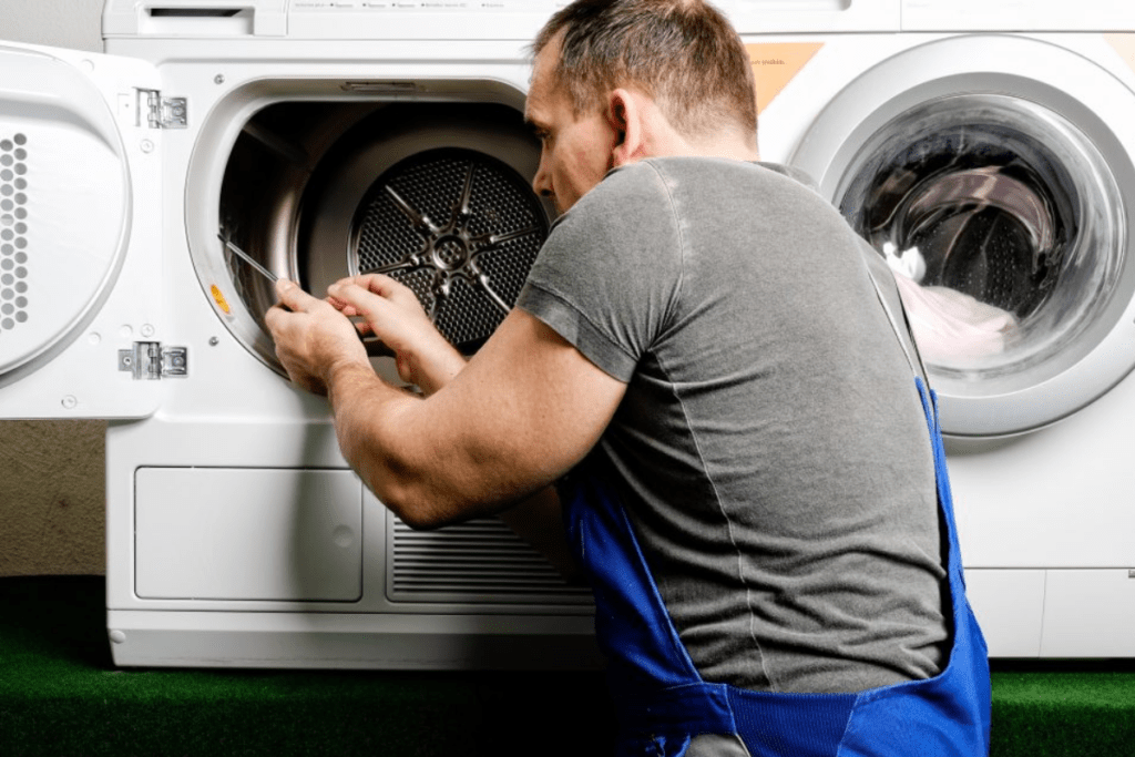Appliance Repair Expert Servicing Dryer