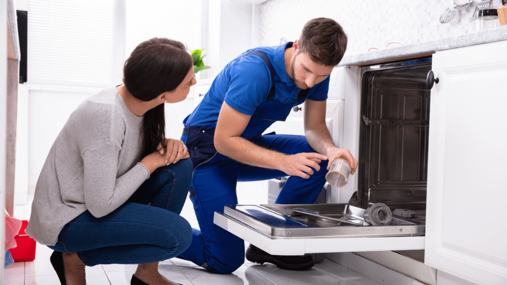 Technician discussing appliance repair with a homeowner for appliance repair in Accokeek MD