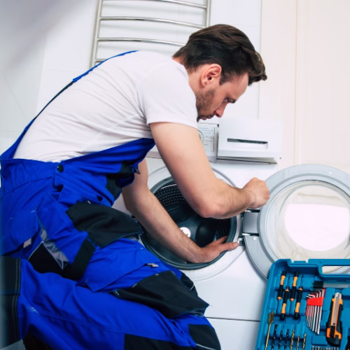 Technician inspecting a washer door hinge for appliance repair in Fairfax Station VA
