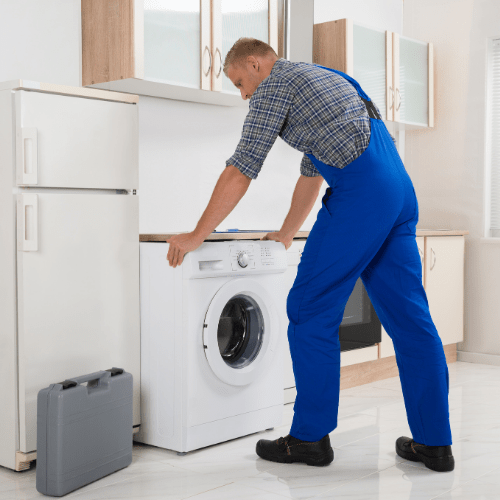 Technician Checking Washer for Appliance Repair in Highland MD