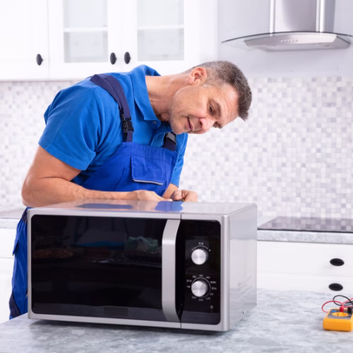 Professional microwave repair technician serving appliance repair in Bethesda MD