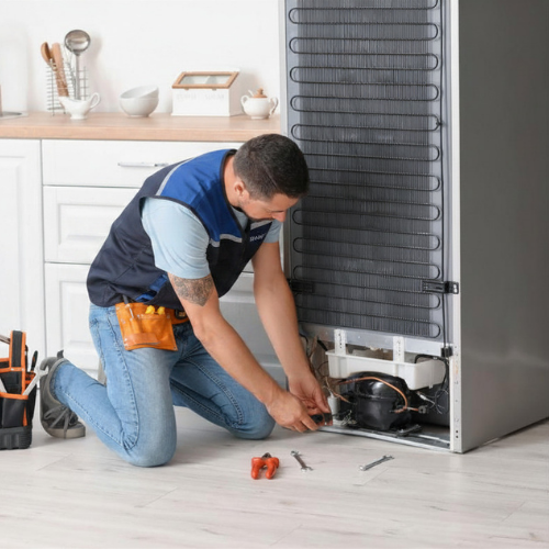Technician doing appliance repair in Rockville MD