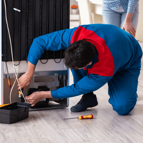 repairing-refrigerator-with-a-customer-for-appliance-repair-in-Herndon-VA