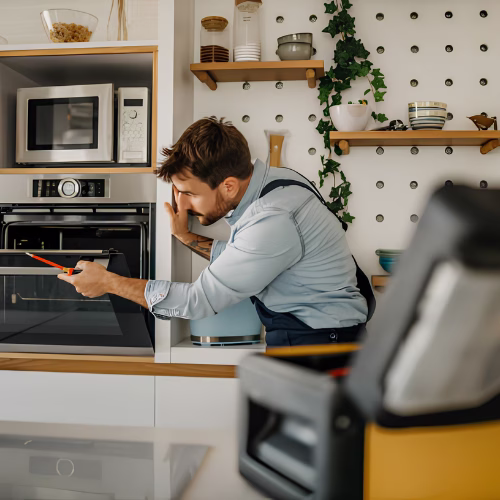 technician servicing home appliance repair in brambleton va