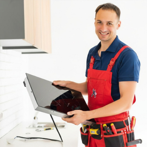 Professional technician repairing a cooktop for appliance repair in Ballenger Creek MD