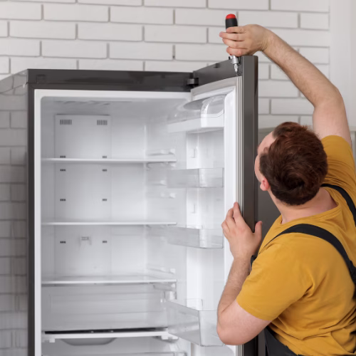 Technician Repairing Refrigerator Roor Gasket for appliance repair in Columbia MD
